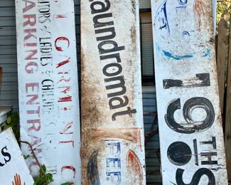 - “S & L Garmet Company” hand painted sign
- “Laundromat” hand painted sign
- “19th st” hand painted sign
