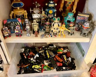 Vintage robots, and a box full of Hotwheels and Matchbox cars