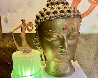 large brass buddha head
