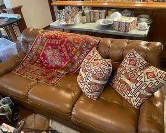 We have 2 of these beautiful leather couches with 2 matching chairs!
