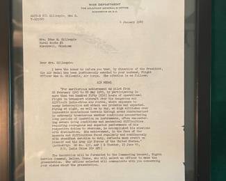 AIR MEDAL GIVEN POSTHUMOUSLY TO THE WIFE OF FLIGHT OFFICER DURING WW-2 BY PRESIDENT HARRY S. TRUMAN.