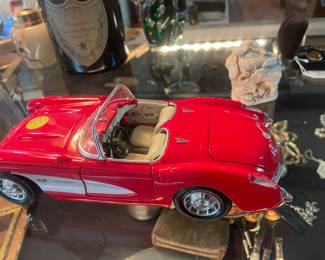 Little red corvette die-cast.