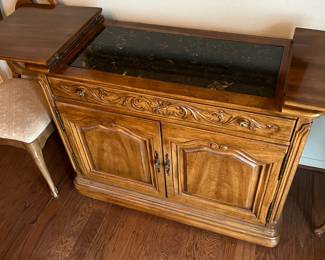 Buffet folded out with marble tap