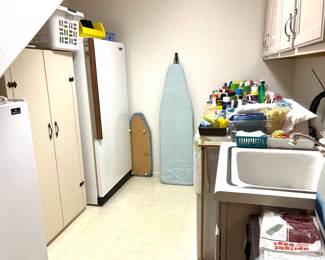 Freezer, refrigerators, storage cabinet and cleaning supplies