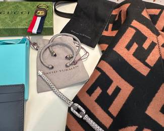 David Yurman bracelets $400-700 and designer accessories, Large Fendi scarf sold. Prices set by estate. 