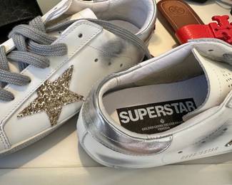 Golden Goose superstar shoes appear to be a size 37 $350