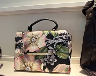 Ted Baker purse $150. Pricing set by estate. 