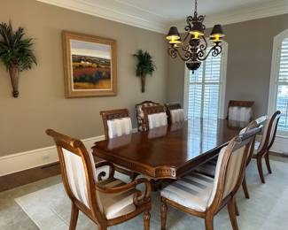 Stately Hekman carved cherry dining table with grandiose seating for 8 