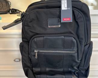 Tumi backpack $400. Pricing firm by estate. 
