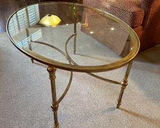 Uttermost current catalogue item! Glass top oval table 