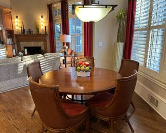 Round kitchen dinette table by Hooker with seating for 6