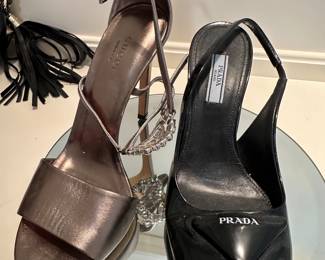 Prada and Gucci heels $500. Pricing firm by estate. 