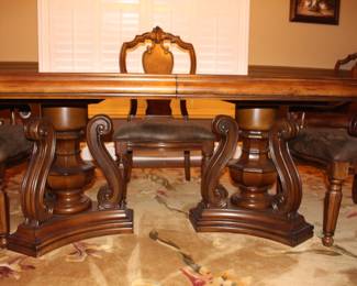 Pulaski Furniture Dining Table with six chairs.                                                            Two arm/captains' chairs plus four side chairs.                                                                 Table comes with two leaves.                                                          BUY IT NOW!   $950.00                                                                              46 1/2"w x 81 1/2 "L x 30 1/2"H