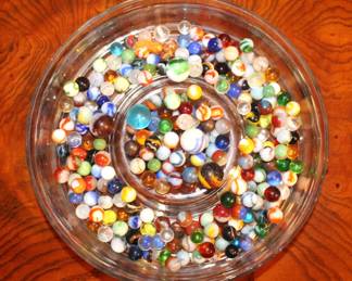 We have three jars of marbles, we have spread them out and pictured here so you can get an understanding of what each jar holds.  