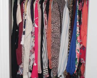 All the blouses in this closet are new with tags.  