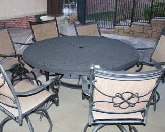 Agio 5' Dia. Round Table and Six Swivel Chairs w/Umbrella Stand Base and 9' Umbrella.                                   BUY IT NOW!    $800.00.