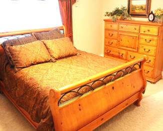 Timbercrest Sleigh Bed and Queen Size Simmons Mattress and Box Spring.     BUY IT NOW!  $375.00.                                         Headboard: 66" W x 48" H. Footboard 66" H x 36" H.    