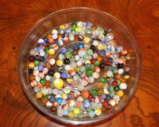 We have three jars of marbles, we have spread them out and pictured here so you can get an understanding of what each jar holds.  