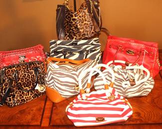 These purses are all Michael Kors.  Very gently used.  