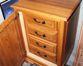 Four Drawer Oak Cabinet.                                                             BUY IT NOW! $50.00               
23" W x 22" D x 35" H.