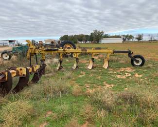 Breaking plow