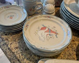 Assorted kitchen items and dish sets