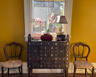 18th Century Handmade India's Sideboard (hand punched metal grill w. inlaid mirrors) 37W x 44H x 151/4D. Price $1025. Pair of Early 18th Century Rosewood Side Chairs. Price $875