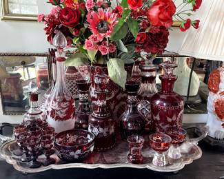 Numerous Exquisite Examples of Bohemian Cranberry Crystal: Vases, Decanters, Bowl, Glasses, Pitchers. Range: $125-$395 each. Antique FootedSilverplaate Extra Large Serving Platter, $375