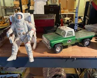 Vintage spaceman toy and pickup truck