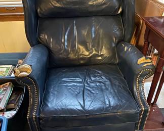Leather arm chair with studs
