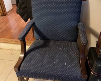 Wooden cushioned arm chair