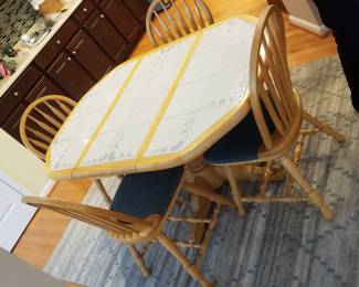 Dining set seats four; made in Buffalo, NY