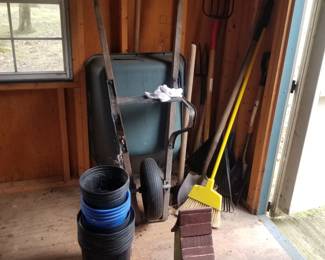 Wheelbarrow and yard supplies