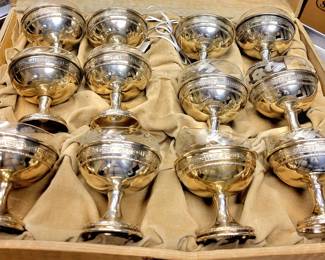 Beautiful Eduardian 12 piece champagne glasses with sterling bases, heavy