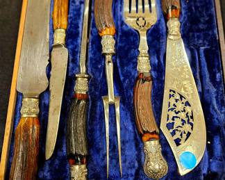 Silver and horn meat carving set. Extremely macho! 
