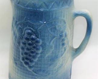Lot 063   11 Bid(s)
Taller pottery pitcher