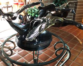 Bronze geese sculpture