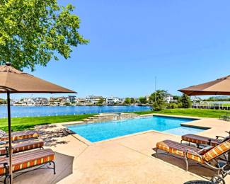 -Cast Aluminum Chaise Lounge Chairs                                     -Umbrellas