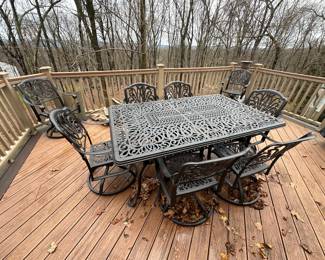 Cadiz Aged Bronze Cast Aluminum with Cushions 9 Piece Swivel Dining Set + 71-103 x 44 in. Double Extension Table