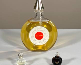 MISC. PERFUME LOT | Includes; Shamilar Eau De Cologne by Guerlain, Hesperides Grapefruit eau du parfum, Poison esprit de parfum, and unlabeled small clear bottle. - h. 7.5 x dia. 4.75 in (Shamilar)

