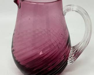 Lot 231 | Pilgrim Cranberry Art Glass Swirl Pitcher Vase