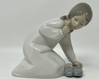 Lot 219 | Lladro Girl with Slippers Porcelain Figurine