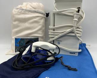 Lot 84 | Travel Iron & Steamer, Silk Cocoon Vintage Camping