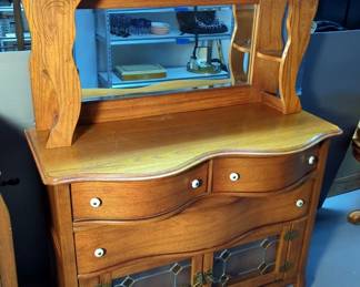 Pulaski Furniture Corp. Vintage Keepsakes Three Drawer Buffet With Detachable Mirror, Lower Lighted Cabinet, And Stained Glass Doors And Brass Hardware, 66" x 46.5" x 18"