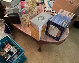 . . . vintage marble-topped coffee table