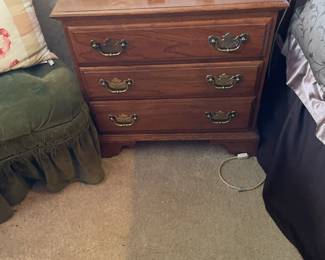 . . . three-drawer oak end table