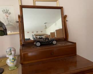 . . . die cast car and dresser mirror