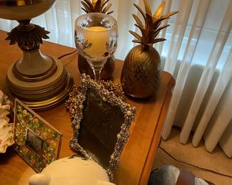 . . . closer look at frames and brass pineapples