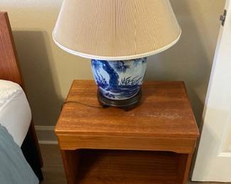 teak nightstand and Asian lamp