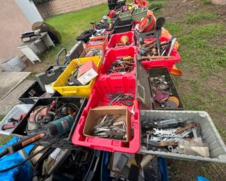 Containers filled with Power Tools and Hand Tools